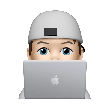 memoji of gregg moore founder of blumoo creative on macbook