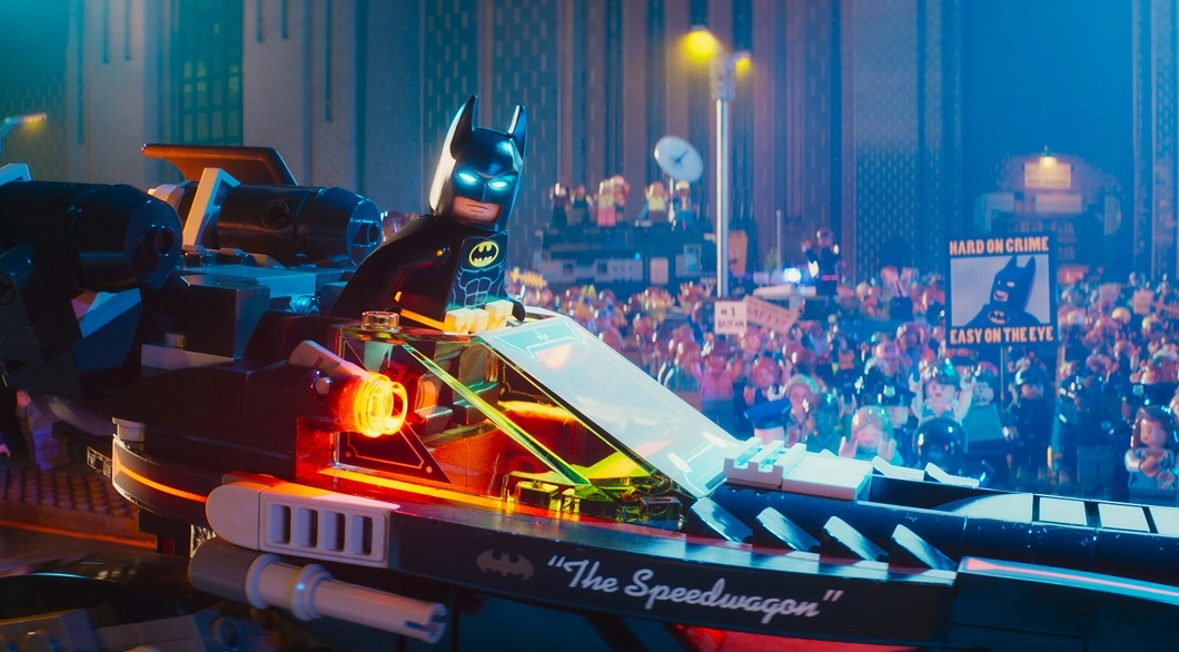 lego batman driving the batmobile